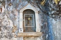 ÃÂ¡ross crucifix in the old stone wall. Royalty Free Stock Photo